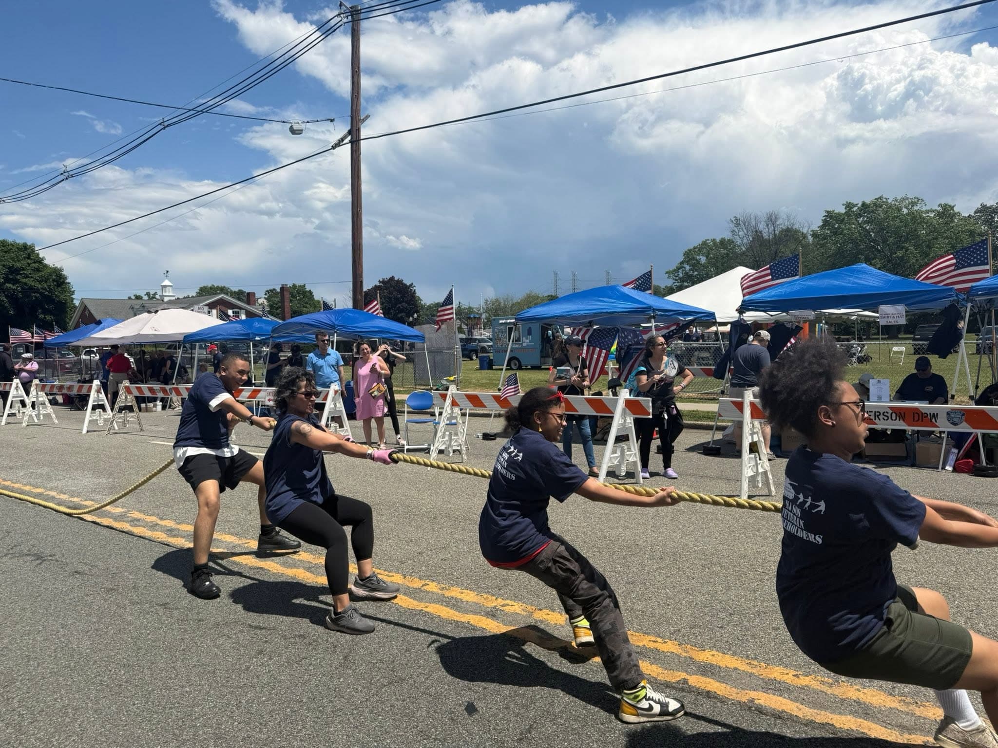 Army Tank Pull participants and spectators in Clifton